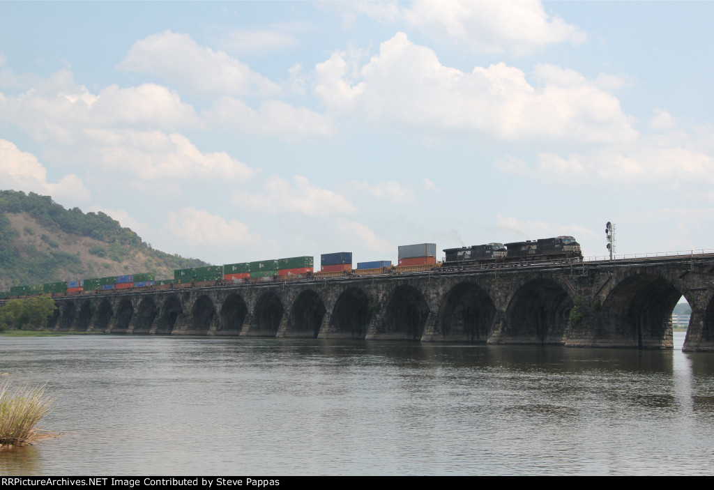 NS 9837 leads a westbound container train over Rockville bridge
